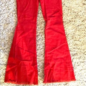 Awesome flared red jeans! I'm just too short for them (5'1). Tags still on them.